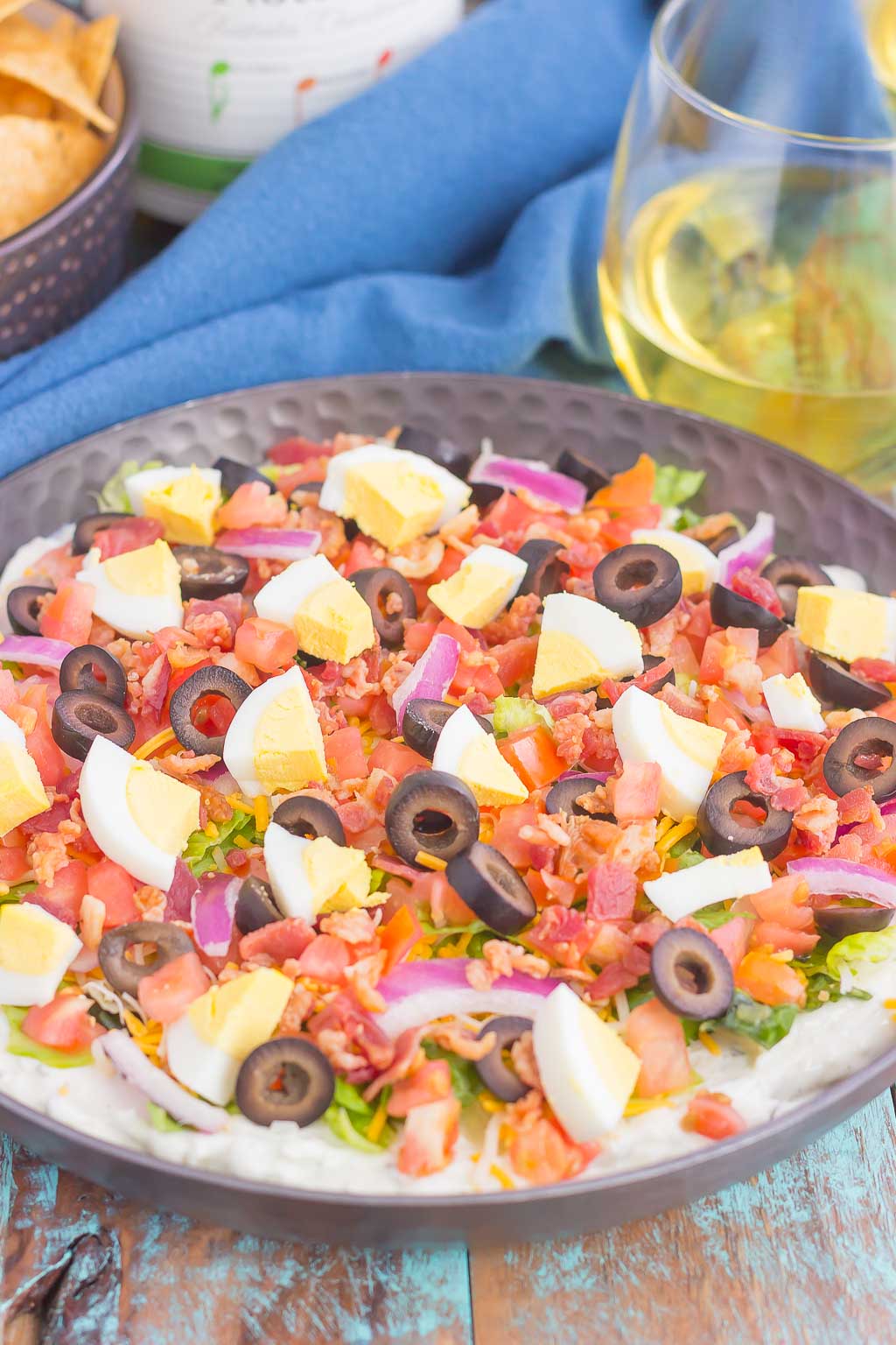 This Cobb Salad Dip is the perfect appetizer for parties, events, and get-togethers. A zesty ranch dip is loaded with the classic flavors of a Cobb salad and is sure to impress even the pickiest of eaters!