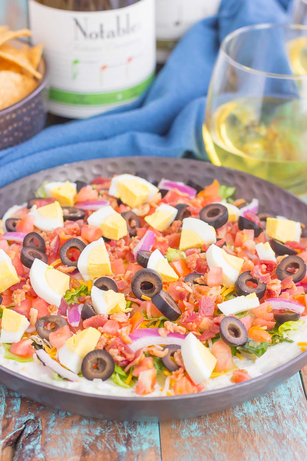 This Cobb Salad Dip is the perfect appetizer for parties, events, and get-togethers. A zesty ranch dip is loaded with the classic flavors of a Cobb salad and is sure to impress even the pickiest of eaters!