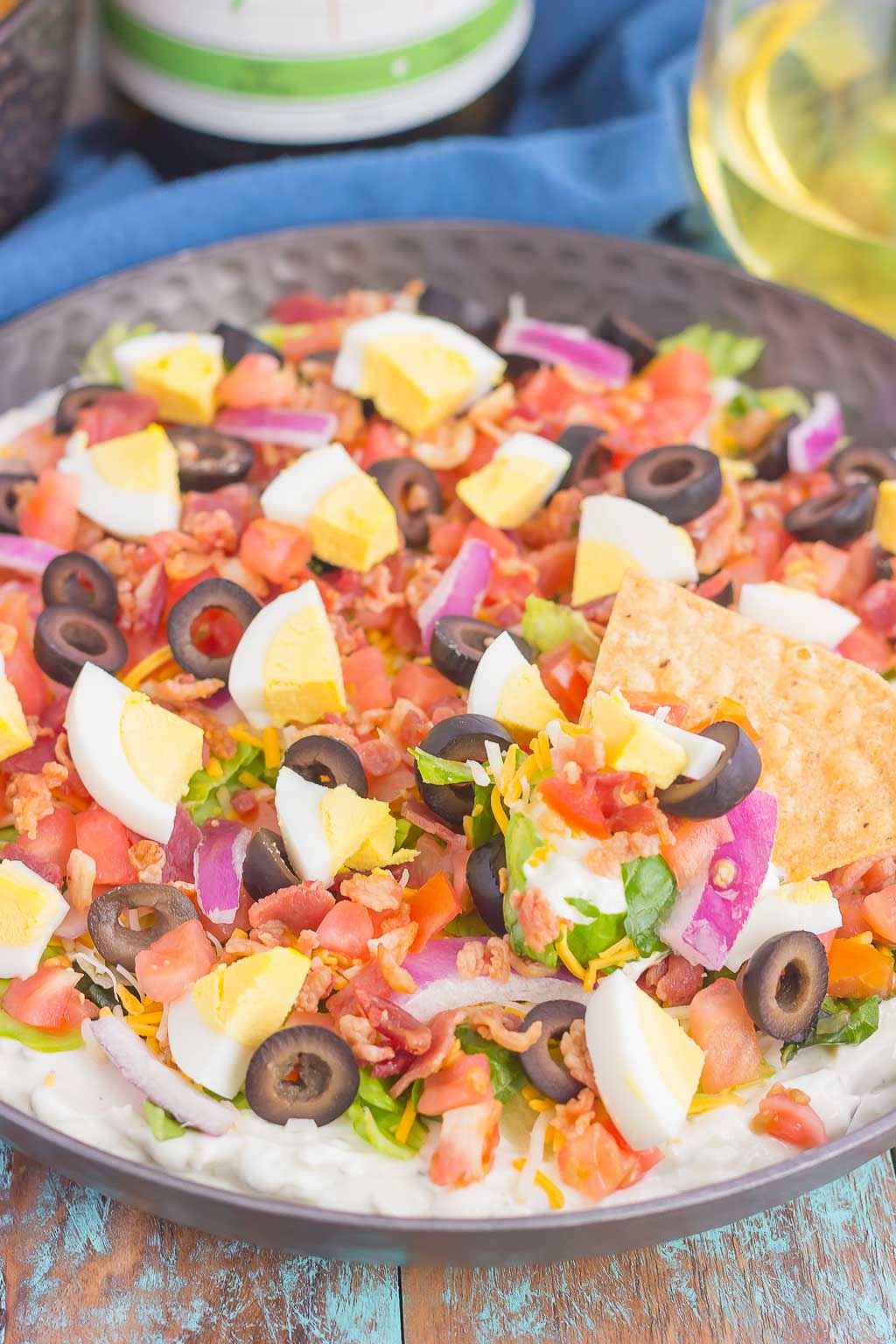 This Cobb Salad Dip is the perfect appetizer for parties, events, and get-togethers. A zesty ranch dip is loaded with the classic flavors of a Cobb salad and is sure to impress even the pickiest of eaters!