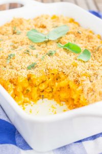 pumpkin mac and cheese in a white dish