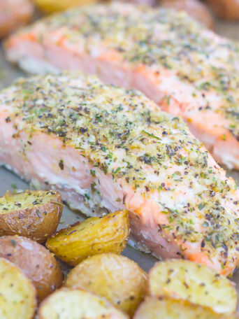 This Sheet Pan Garlic Herb Salmon with Roasted Potatoes and Asparagus makes the perfect meal for busy weeknights. Everything is roasted on one pan, seasoned to perfection and made with just a few ingredients. Easy to make and even better to eat, this one pan meal is sure to be a hit at the dinner table!