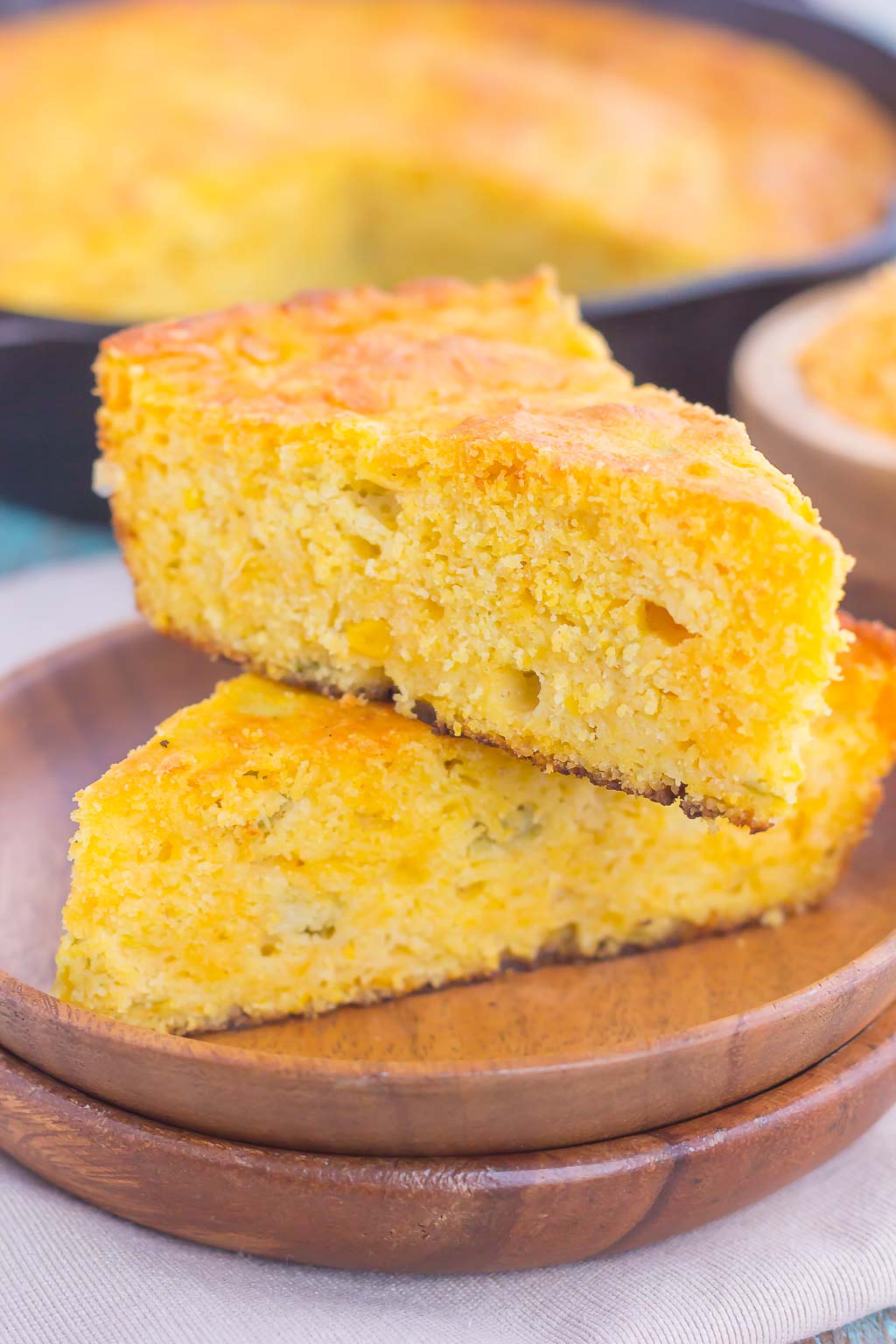 This Southwest Skillet Cornbread is the perfect combination of sweet and spicy that will be a favorite for years to come. Loaded with cheddar cheese, green chiles, and creamed corned, this easy cornbread bakes up moist, tender, and full of flavor! #cornbread #cornbreadrecipe #skilletcornbread #southwestcornbread #breadrecipe