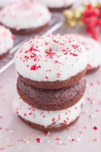 a stack of chocolate peppermint donuts