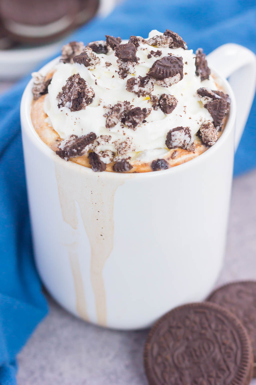 a mug of hot chocolate from scratch topped with Oreo cookies 