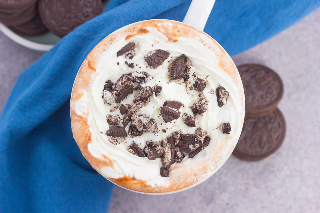 This Cookies and Cream Hot Chocolate is creamy, decadent, and ready in less than 10 minutes. Made with two kinds of chocolate and sprinkled with crushed Oreo cookies, this dreamy drink is the perfect cure for those winter blues!