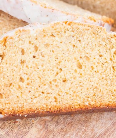 This Glazed Eggnog Bread is filled with warm holiday spices and makes a deliciously festive treat. Soft, moist and bursting with a subtle hint of eggnog, you'll love the flavors of this bread that would make a decadent breakfast or dessert!