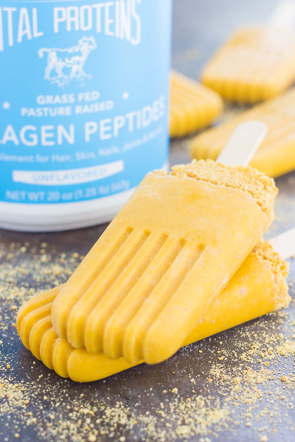 These Pumpkin Pie Pops taste just like the classic pie, but in frozen form. Sprinkled with a graham cracker crust and filled with healthier ingredients, these creamy pops are the perfect dessert for the season!
