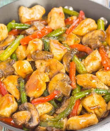 an easy chicken stir-fry with veggies in a pan