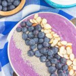 This Blueberries and Cream Smoothie Bowl is just what you need to get you going in the morning. Packed with sweet blueberries, Greek yogurt, and healthier ingredients, this thick and creamy smoothie bowl is loaded with flavor and all of the fun toppings!