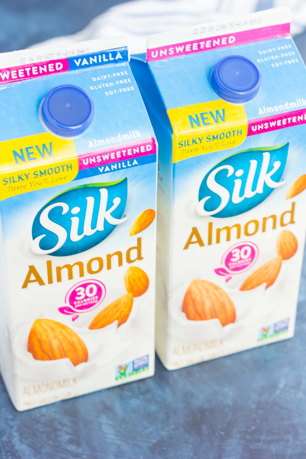 Two cartons of Silk almond milk, side by side. 