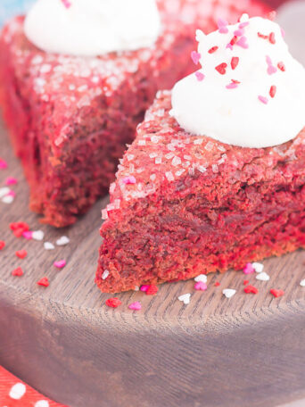 These Red Velvet Scones are crispy on the outside, tender on the inside, and bursting with a rich, chocolatey flavor. Topped with a sweet vanilla whipped cream, this decadent treat makes the most delicious breakfast or dessert!