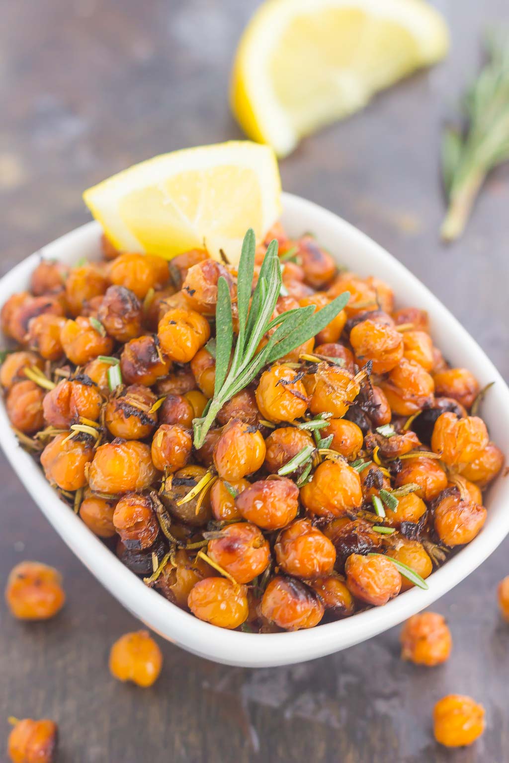 These Roasted Lemon Rosemary Chickpeas make a delicious snack or great addition to salads or soups. Packed with tangy lemon and fresh rosemary, these crunchy chickpeas are easy to make and perfect for when the munchies strike!