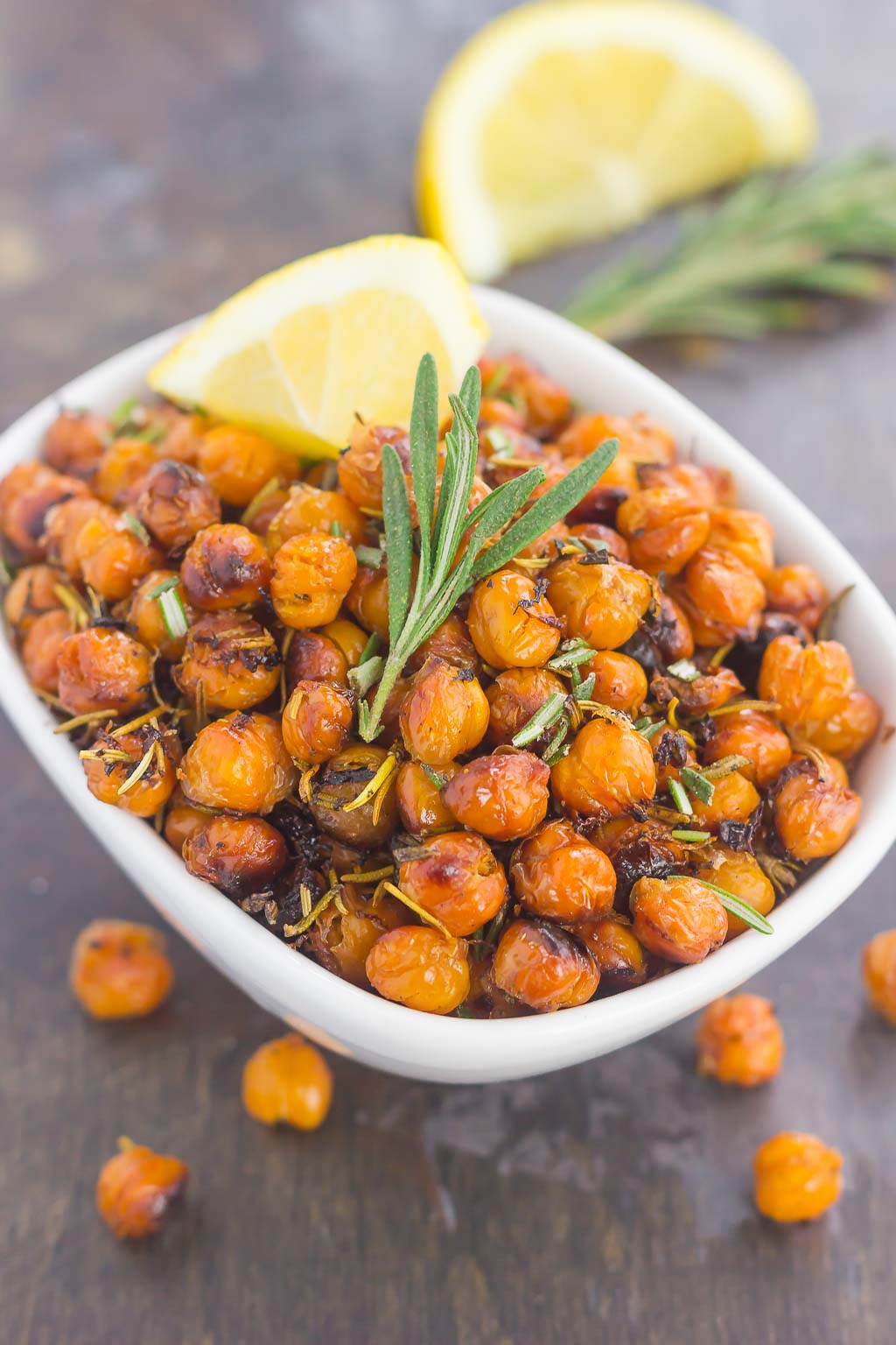 These Roasted Lemon Rosemary Chickpeas make a delicious snack or great addition to salads or soups. Packed with tangy lemon and fresh rosemary, these crunchy chickpeas are easy to make and perfect for when the munchies strike!