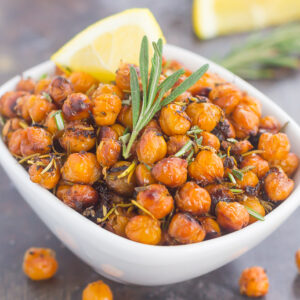 These Roasted Lemon Rosemary Chickpeas make a delicious snack or great addition to salads or soups. Packed with tangy lemon and fresh rosemary, these crunchy chickpeas are easy to make and perfect for when the munchies strike!