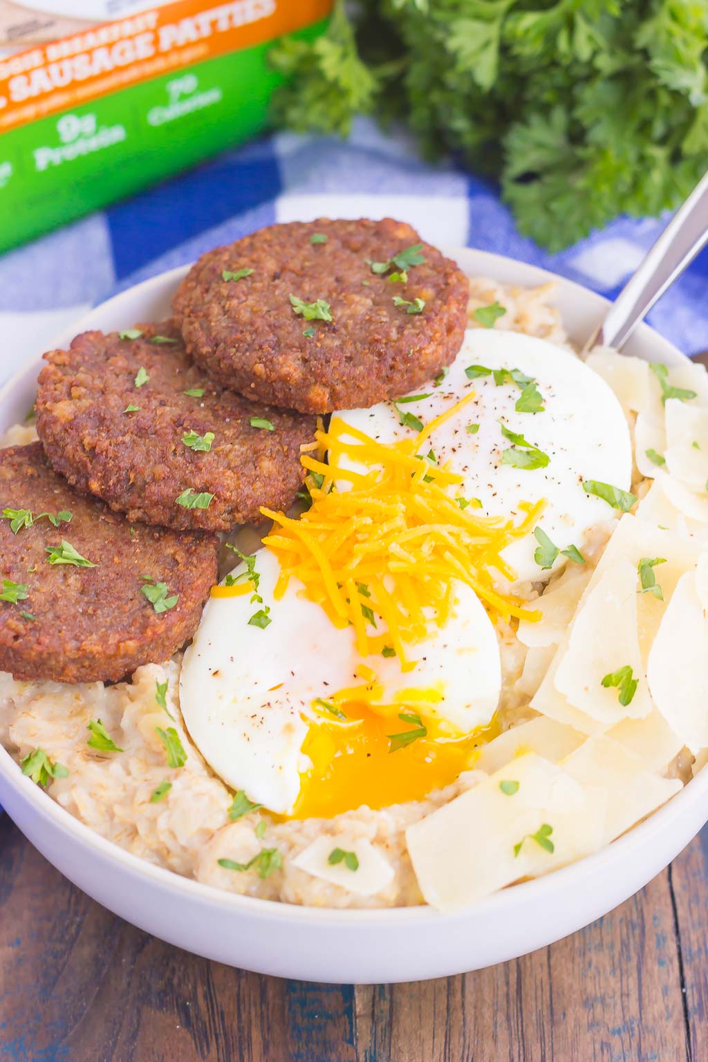 Savory Parmesan Oatmeal is a delicious way to switch up your breakfast routine. Packed with hearty oats, fresh Parmesan cheese and veggie sausage, this simple dish is a great option for when you want a warm and comforting meal! #oatmeal #savoryoatmeal #oatmealbowl #breakfast #easybreakfast #heartybreakfast