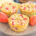 These Strawberry Banana Baked Oatmeal Cups are the perfect make-ahead breakfast for busy mornings. Packed with hearty oats, fresh strawberries and sweet bananas, this simple dish is easy to make, healthier, and loaded with flavor!