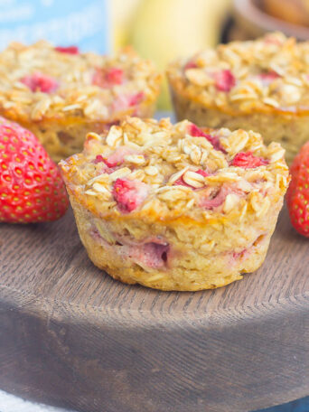 These Strawberry Banana Baked Oatmeal Cups are the perfect make-ahead breakfast for busy mornings. Packed with hearty oats, fresh strawberries and sweet bananas, this simple dish is easy to make, healthier, and loaded with flavor!