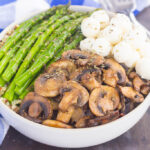 If you’re looking for a new favorite recipe, this Asparagus and Mushroom Quinoa Bowl will become a regular in your meal rotation. Hearty quinoa is tossed in a white balsamic dressing and then topped with roasted asparagus and fresh mushrooms. Fast, fresh and flavorful, this easy meal makes a delicious lunch or dinner!