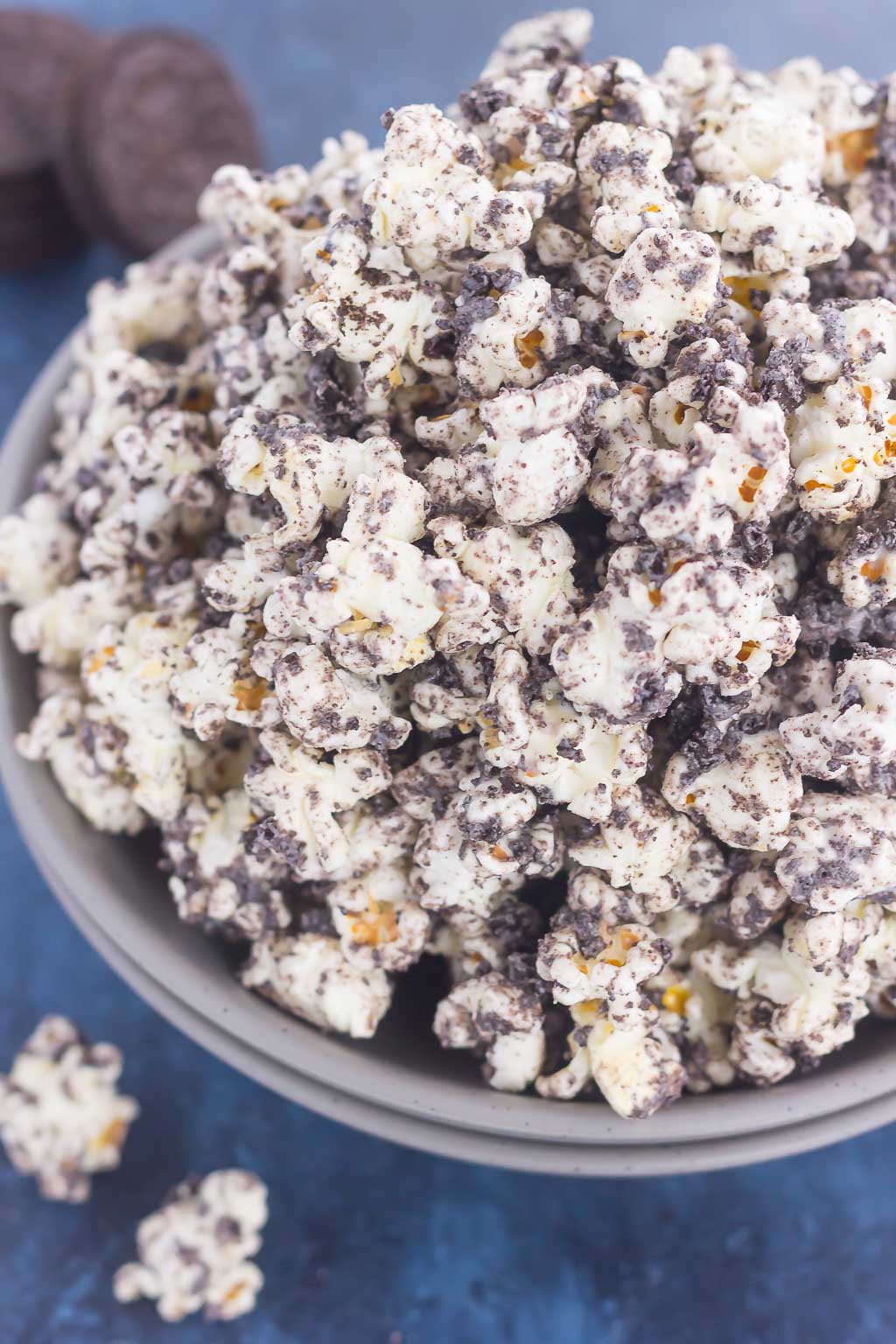 Overhead view of an overflowing bowl of cookies and cream popcorn.