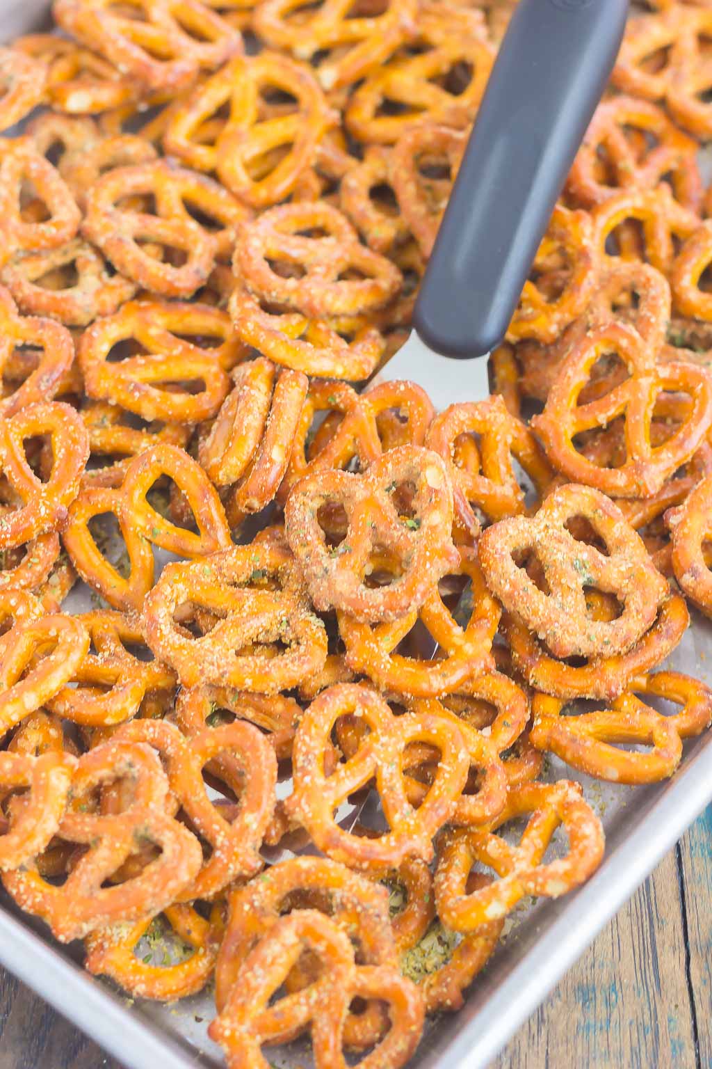 close up of ranch seasoned pretzels on a baking tray 