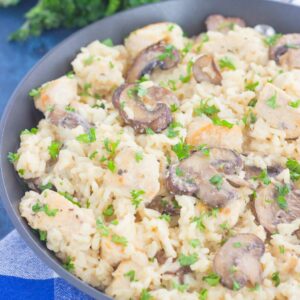 This One Pan Chicken and Mushroom Parmesan Rice is perfect for busy weeknights. Just a few simple ingredients is all it takes for this easy, one pan meal that's packed with flavor. It's guaranteed to be a favorite all year long!