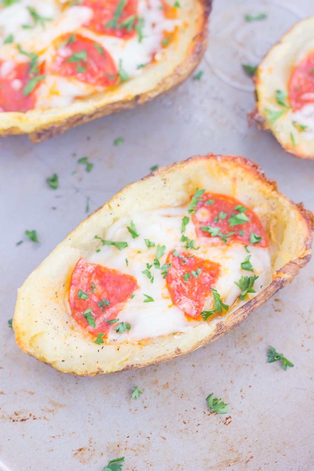 Loaded with pizza sauce, fresh mozzarella cheese, pepperoni and seasonings, these Pizza Potato Skins are sure to be a crowd-pleasing appetizer or snack!