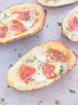 Loaded with pizza sauce, fresh mozzarella cheese, pepperoni, and seasonings, these Pizza Potato Skins are sure to be a crowd-pleasing appetizer or snack!