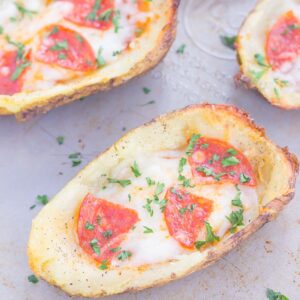 Loaded with pizza sauce, fresh mozzarella cheese, pepperoni, and seasonings, these Pizza Potato Skins are sure to be a crowd-pleasing appetizer or snack!