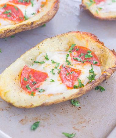 Loaded with pizza sauce, fresh mozzarella cheese, pepperoni, and seasonings, these Pizza Potato Skins are sure to be a crowd-pleasing appetizer or snack!