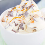 This {No-Churn} Salted Caramel Chocolate Chunk Ice Cream is a simple, must-make treat for the summer. Sweet vanilla ice cream is swirled with rich, salted caramel and loaded with chunks of chocolate. Easy to make and with no ice cream maker needed, you can have this decadent dessert ready in no time!