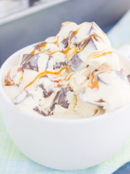 This {No-Churn} Salted Caramel Chocolate Chunk Ice Cream is a simple, must-make treat for the summer. Sweet vanilla ice cream is swirled with rich, salted caramel and loaded with chunks of chocolate. Easy to make and with no ice cream maker needed, you can have this decadent dessert ready in no time!