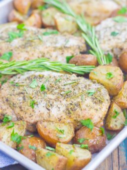 This Sheet Pan Rosemary Herb Pork Chops and Roasted Potatoes is a deliciously easy meal for busy nights. Made entirely on one pan and seasoned to perfection with fresh rosemary and herbs, this simple dish is sure to be a dinnertime favorite all year long!