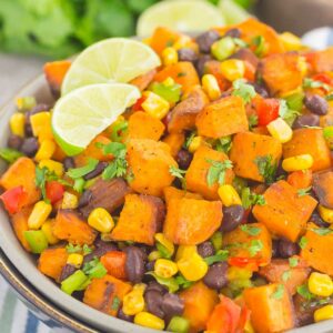 This Southwestern Sweet Potato Salad is loaded with roasted chile lime sweet potatoes, black beans, corn, cilantro, and tossed in a light honey lime dressing. It's perfect for picnics, barbecues and sweet potato lovers everywhere!