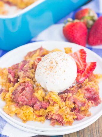 This Strawberry Cinnamon Dump Cake is a deliciously easy dessert that's loaded with flavor. With just four ingredients and hardly any prep time, this simple cake tastes like your favorite cobbler, but without all of the work. Filled with fresh strawberries, a hint of cinnamon and topped with a buttery, crumbly topping, this dessert is sure to be a winner all year long!