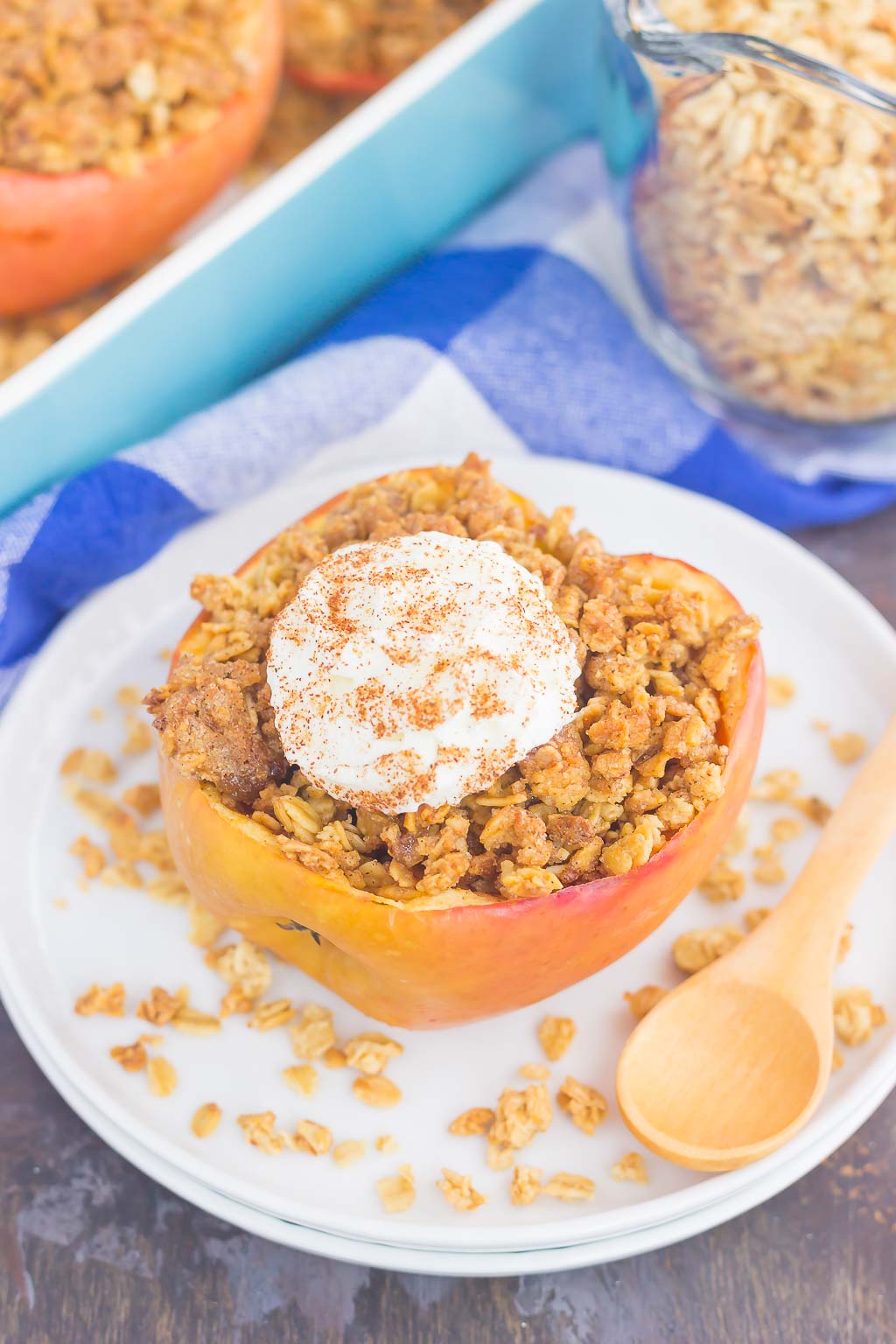 stuffed baked apple on a white plate 