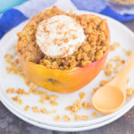 These Baked Apples with Granola make a simple breakfast, mid-morning snack, or easy dessert. Sweet apples are filled with a brown sugar granola mixture and then baked until tender. Top them with a dollop of ice cream or whipped cream and you'll be baking these over and over again!