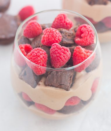 Raspberry Brownie Parfaits make a simple dessert that's ready in no time. Rich brownie chunks and fresh raspberries are layered together with whipped chocolate pudding to create the perfect sweet treat!