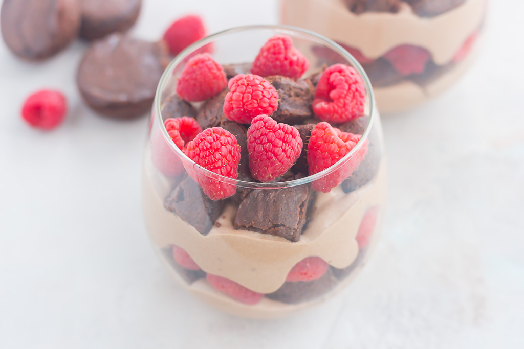 Raspberry Brownie Parfaits make a simple dessert that's ready in no time. Rich brownie chunks and fresh raspberries are layered together with whipped chocolate pudding to create the perfect sweet treat!