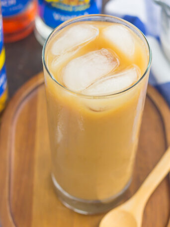 This Salted Caramel Almond Iced Coffee is an easy, three ingredient drink to beat the summer heat. Bold coffee is combined with almond milk and a hint of salted caramel syrup to create a smooth and decadent flavor. Ready in less than 5 minutes and perfect for just about any day, you'll be sipping on this sweet treat all year long!