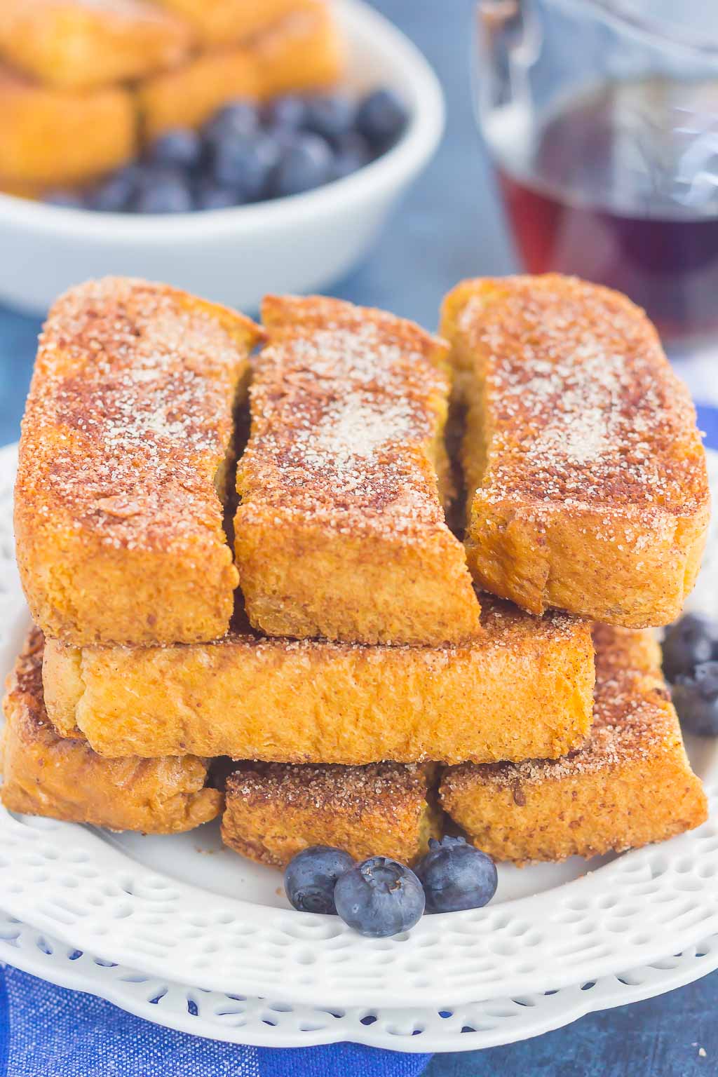 baked french toast sticks on white plate