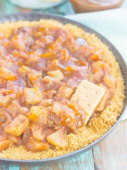 This Easy Caramel Apple Pie Dip tastes just like the classic pie, but without all of the prep work. Fresh apples are tossed with spices and then sautéed until tender. Drizzled with caramel and loaded onto a buttery graham cracker crust, this simple dessert is loaded with fall flavors!