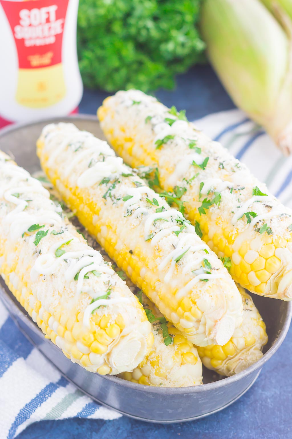 Parmesan Herb Corn on the Cob in a silver tray