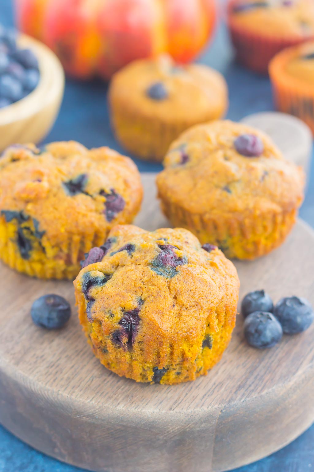 These Pumpkin Blueberry Muffins are soft, moist and bursting with cozy fall flavors. Packed with sweet pumpkin and juicy blueberries, this easy treat makes the perfect fall breakfast or snack! #pumpkinmuffins #pumpkinblueberrymuffins #muffins #blueberrymuffins #pumpkinbreakfast #pumpkindessert #falldessert #dessert #breakfast