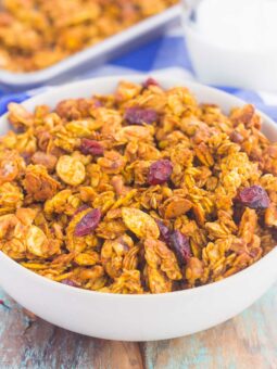 pumpkin spice granola in a white bowl