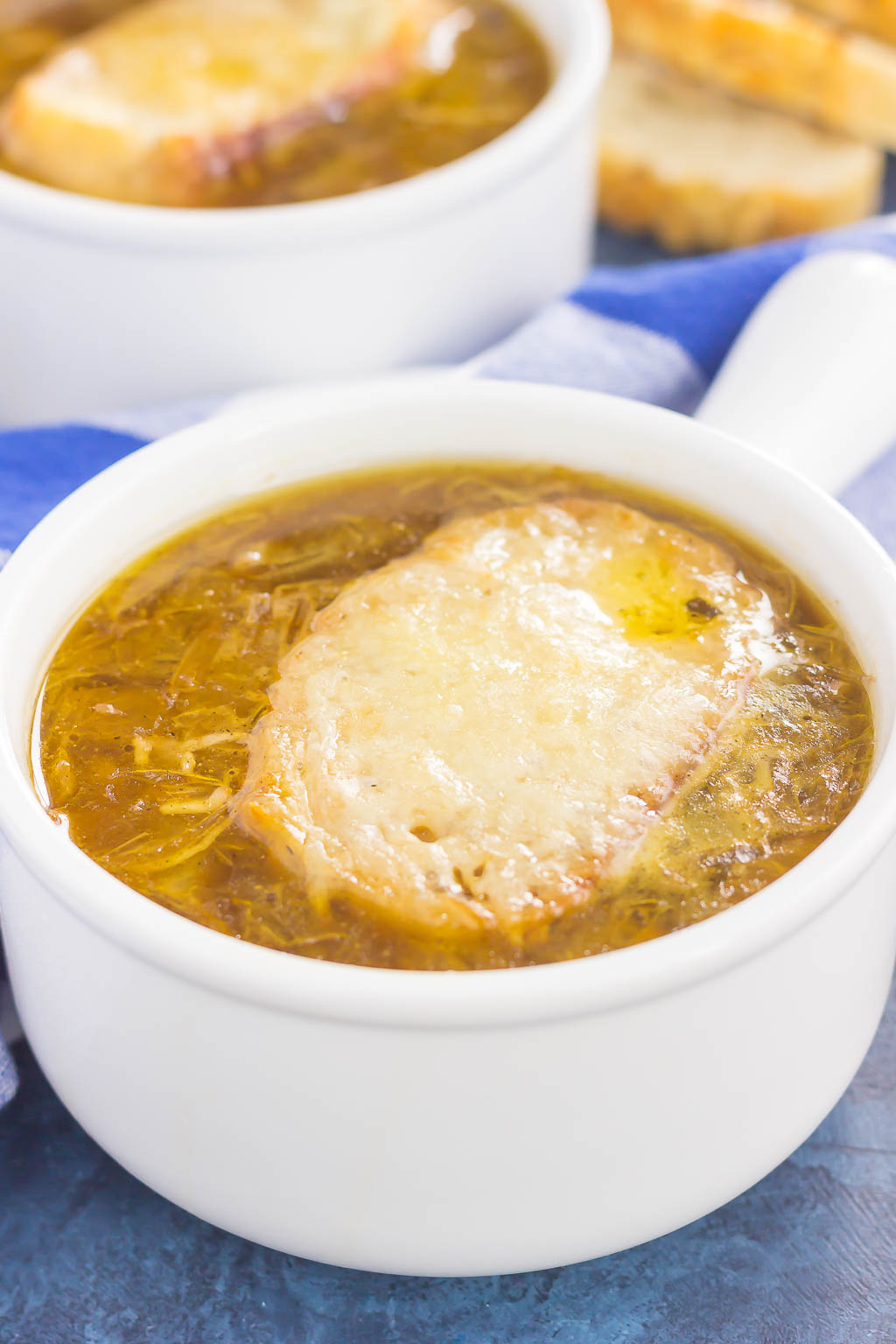 French Onion Soup is loaded with caramelized onions, a rich and savory broth, and just the right amount of spices. It takes just minutes to prepare, letting your stove do the rest of the work. Topped with a piece of French bread and smothered with melted cheese, this is the ultimate soup to warm you up on a chilly day!