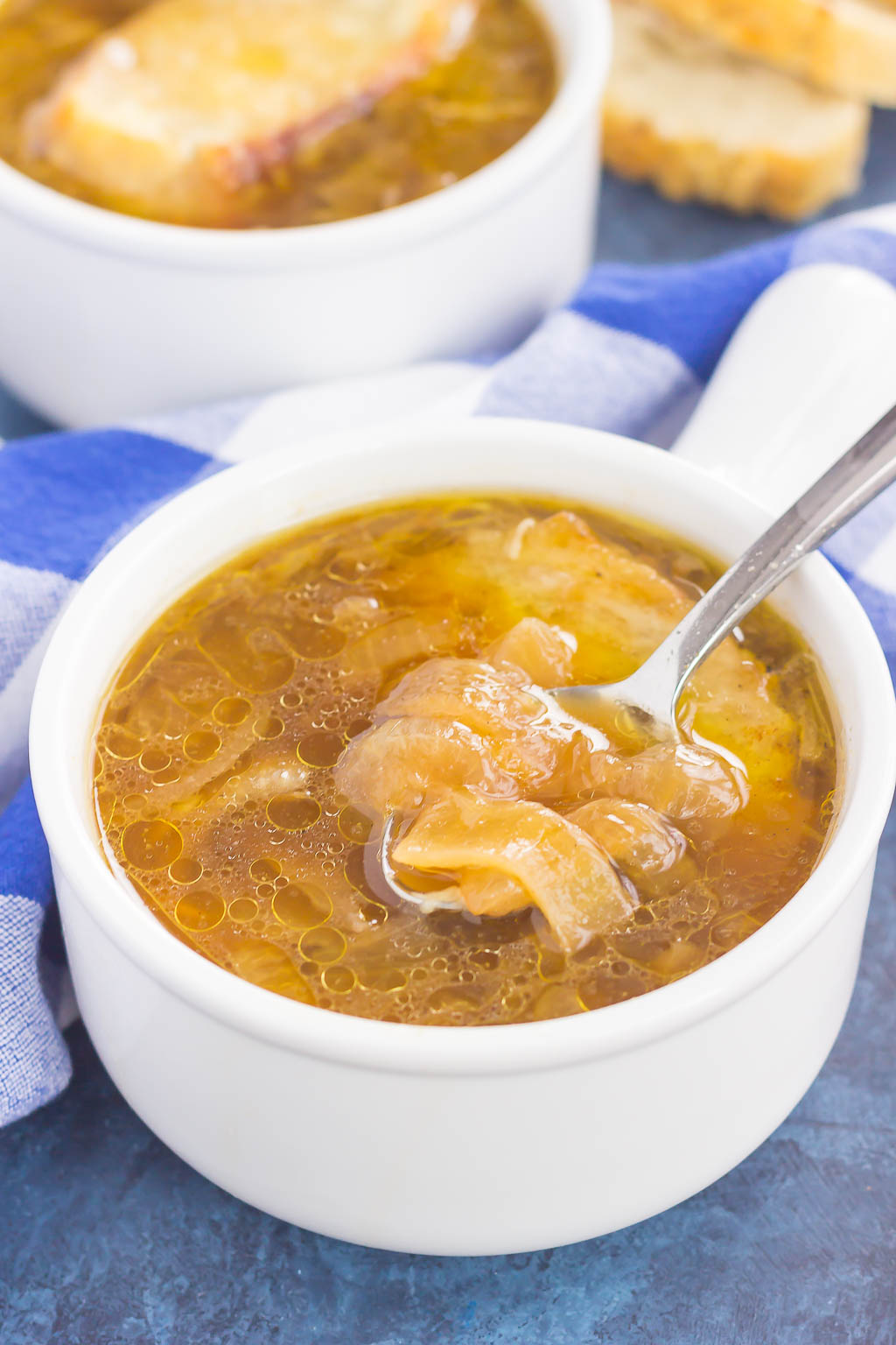 French Onion Soup is loaded with caramelized onions, a rich and savory broth, and just the right amount of spices. It takes just minutes to prepare, letting your stove do the rest of the work. Topped with a piece of French bread and smothered with melted cheese, this is the ultimate soup to warm you up on a chilly day!