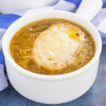 French Onion Soup is loaded with caramelized onions, a rich and savory broth, and just the right amount of spices. It takes just minutes to prepare, letting your stove do the rest of the work. Topped with a piece of French bread and smothered with melted cheese, this is the ultimate soup to warm you up on a chilly day!