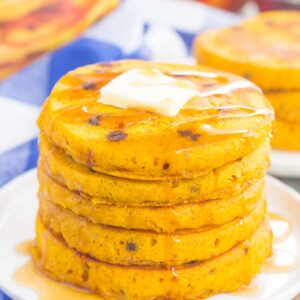 These Pumpkin Chocolate Chip Pancakes make a deliciously cozy breakfast for fall. Filled with sweet pumpkin and bursting with chocolate chips, these simple pancakes are soft, fluffy and so easy to make! 
