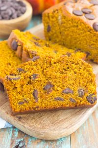 This Pumpkin Peanut Butter Spice Bread is filled with a warm pumpkin flavor, dark chocolate chips, and creamy peanut butter. Easy to make and filled with an irresistible combination, this spiced bread will become your favorite breakfast or dessert of the season!