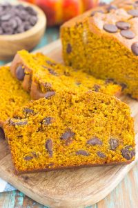 This Pumpkin Peanut Butter Spice Bread is filled with a warm pumpkin flavor, dark chocolate chips, and creamy peanut butter. Easy to make and filled with an irresistible combination, this spiced bread will become your favorite breakfast or dessert of the season!